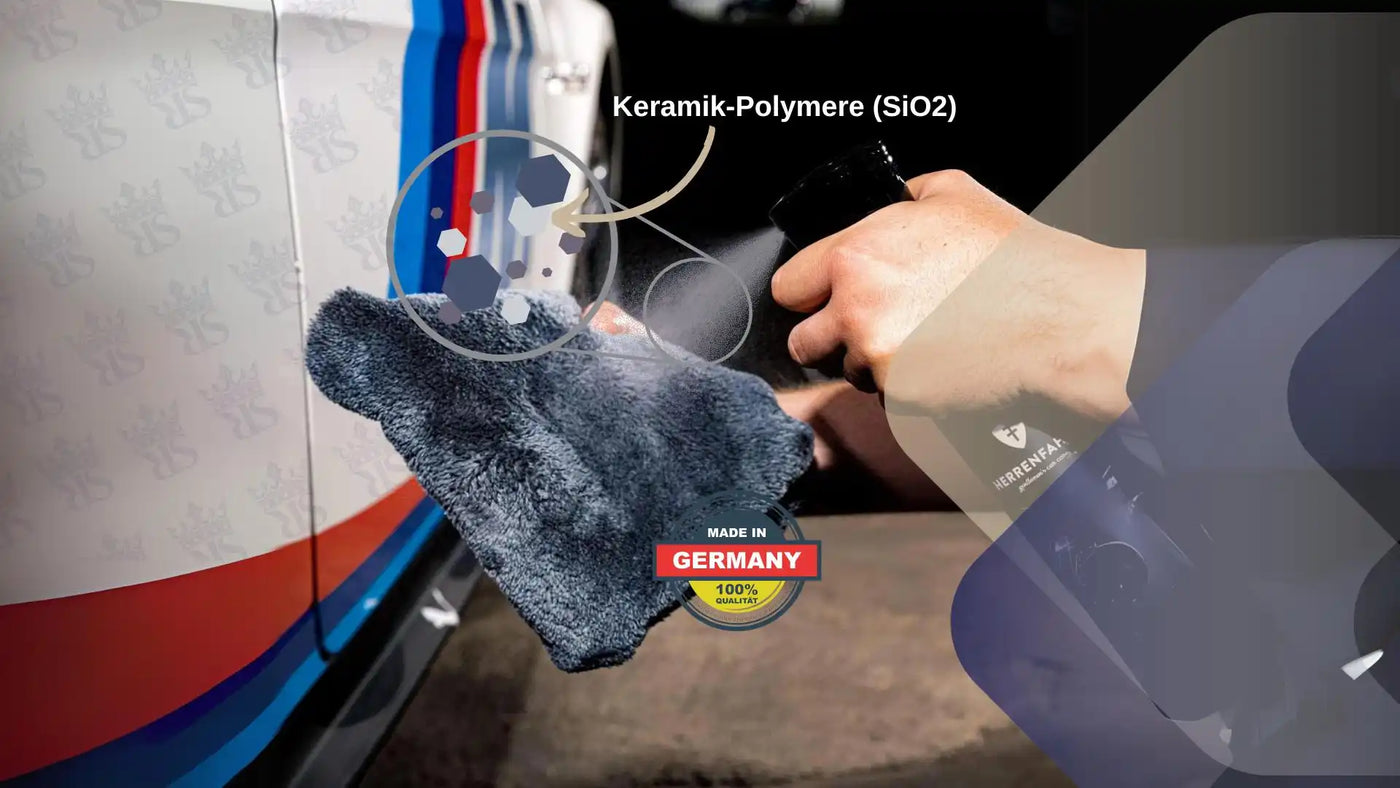 Hand zieht keramischen Polymer-Spray auf ein Auto mit einem Mikrofasertuch auf.